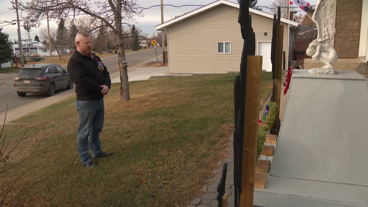 Darren Longstaff creates a Remembrance Day memorial in his yard each year.