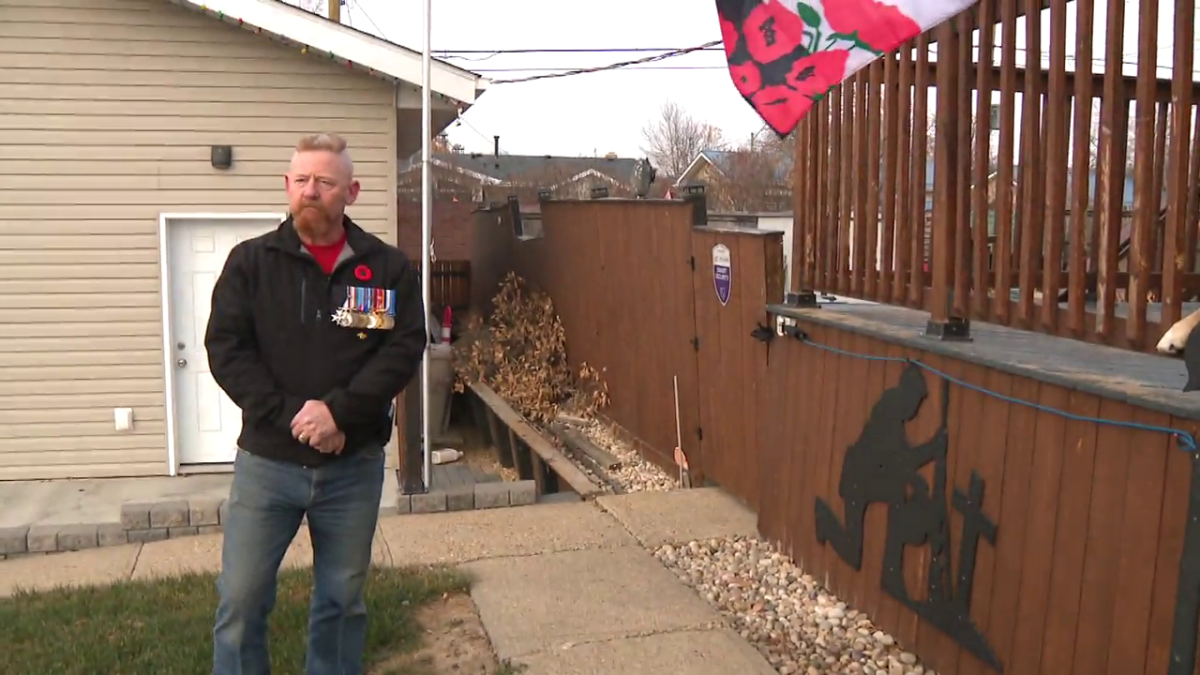Darren Longstaff creates a Remembrance Day memorial in his yard each year.