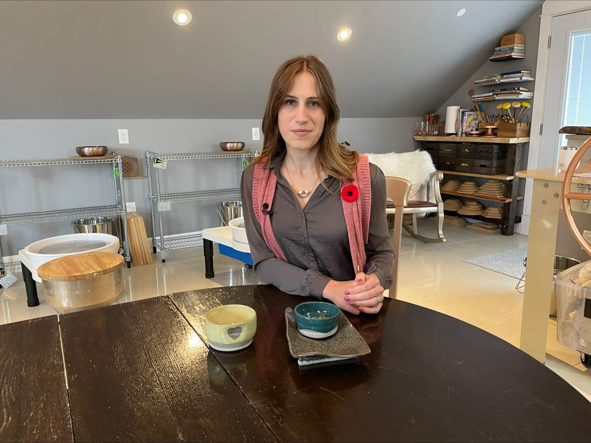 Veteran Ilona Inman shows the creation she made for The Cerberus Helmet Project.