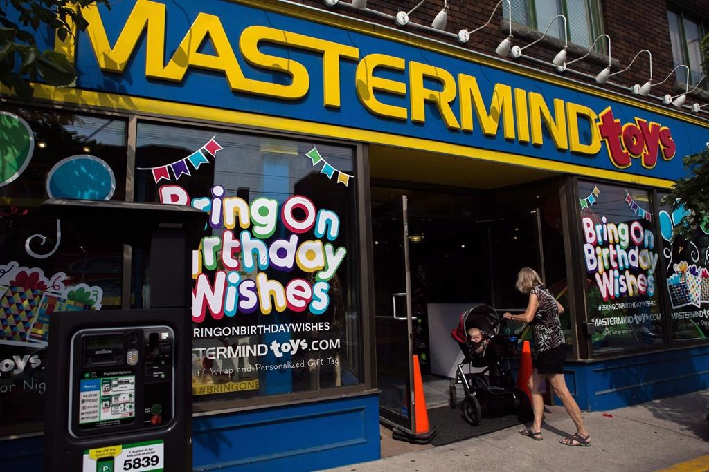 A customer walks into Mastermind Toys store on Queen St. East in Toronto on Tuesday, September 19, 2017. THE CANADIAN PRESS/Chris Donovan.