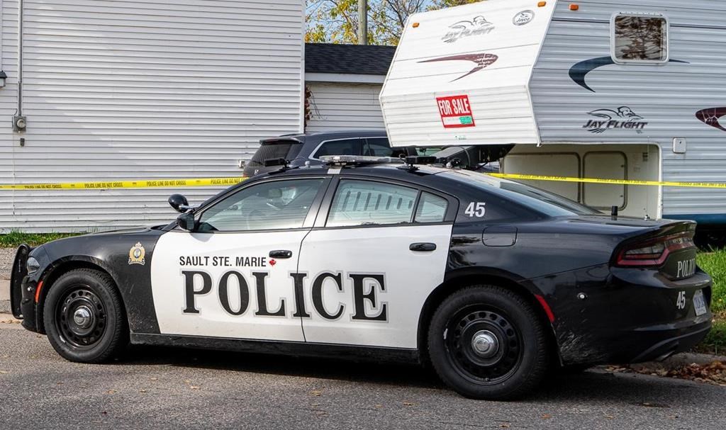 A Sault Ste. Marie police officer is facing sexual assault charges after an investigation into alleged incidents that took place last year. Police attend a crime scene in Sault Ste. Marie, Ont., Tuesday, Oct. 24, 2023. THE CANADIAN PRESS/Bob Davies.