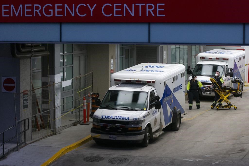 EMS transported five people, including one child, to the hospital after a five-vehicle collision early Saturday morning. Paramedics push a gurney towards an ambulance outside a Toronto hospital on Jan. 5, 2022.