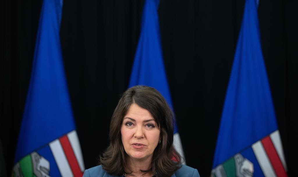 Alberta Premier Danielle Smith speaks in Edmonton on Wednesday Nov. 8, 2023. Alberta’s ethics commissioner says no rules were broken when the former chief medical officer of health was hired — then promptly fired — for a new job with the province.