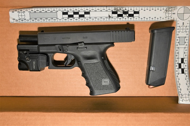 Police searched the vehicle and a loaded Glock handgun with a prohibited magazine was allegedly found.