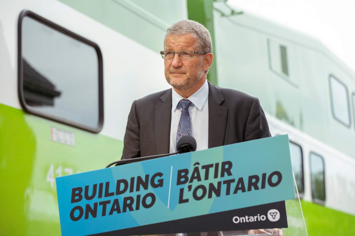 Metrolinx president and CEO Phil Verster joins Ontario Premier Doug Ford in making a GO Transit announcement in Niagara Falls, Ont., Friday, Aug. 26, 2022.