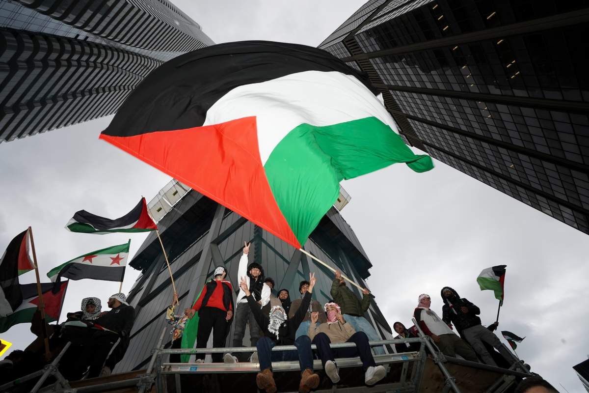 Protestors attend a march in support of Palestinians in Toronto, Monday, Oct. 9, 2023. THE CANADIAN PRESS/Arlyn McAdorey