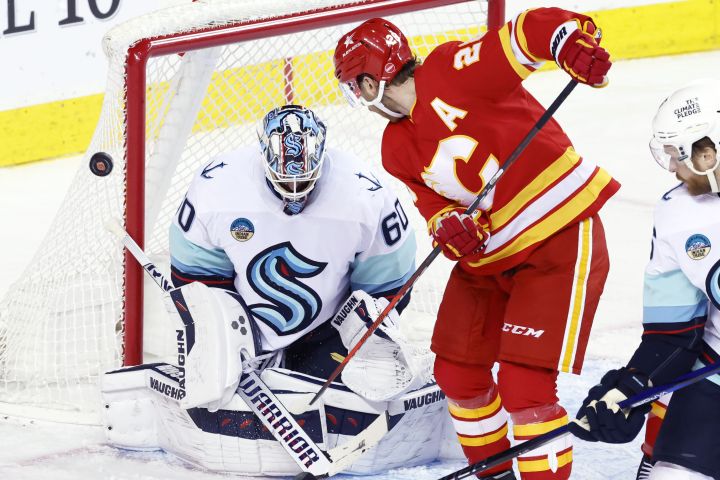 Driedger makes 37 saves in NHL return as Kraken hold off Flames 2-1