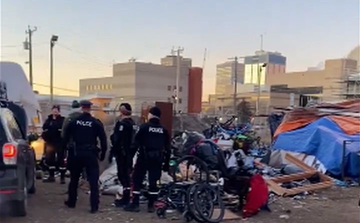 City and police begin dismantling central Edmonton homeless encampment