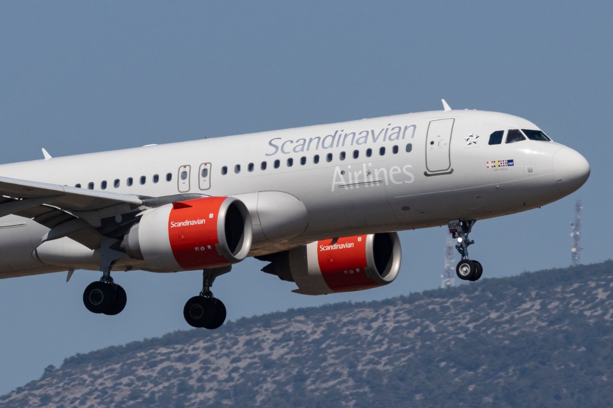File photo of a Scandinavian Airlines Airbus A320neo aircraft landing at Athens International Airport. A Russian man has been charged as a stowaway after he boarded a flight to L.A. without a ticket or passport.