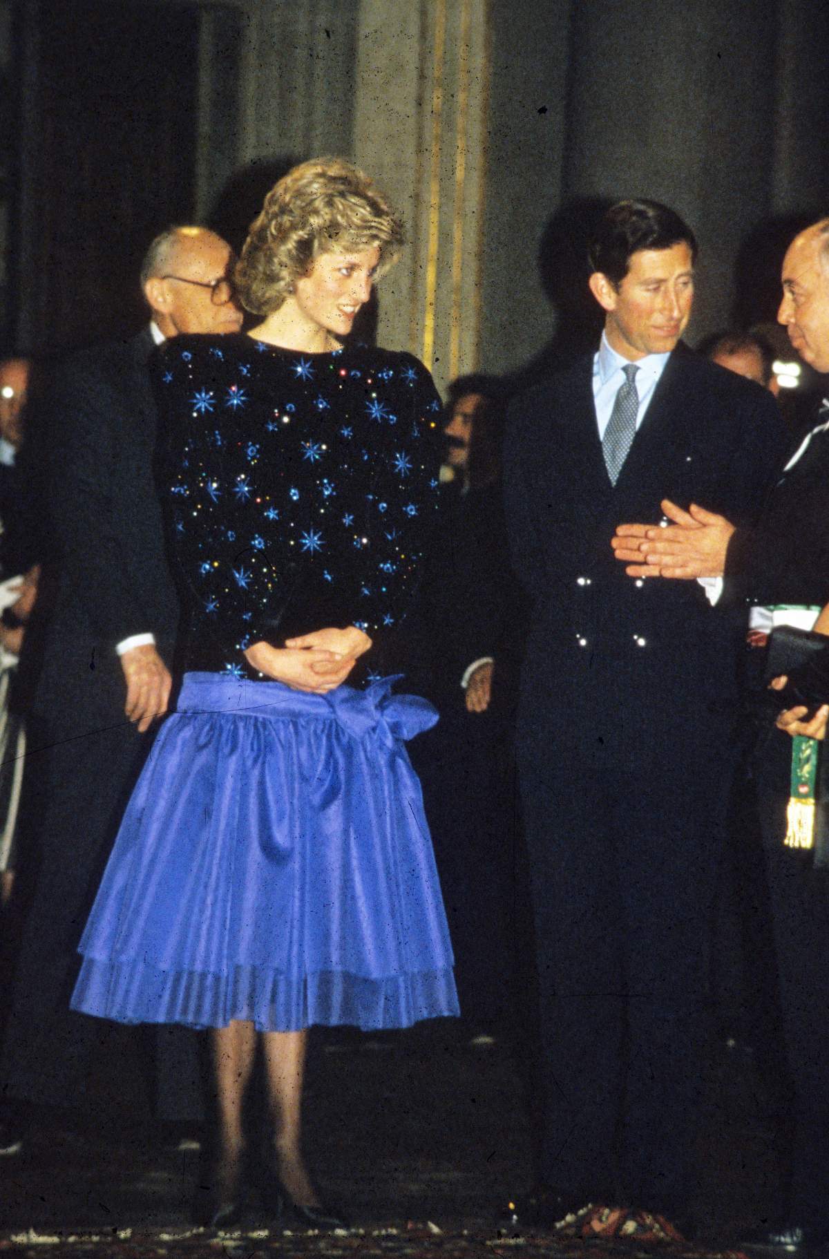 Princess Diana in her Jacques Azagury dress. She is standing next to then Prince Charles.