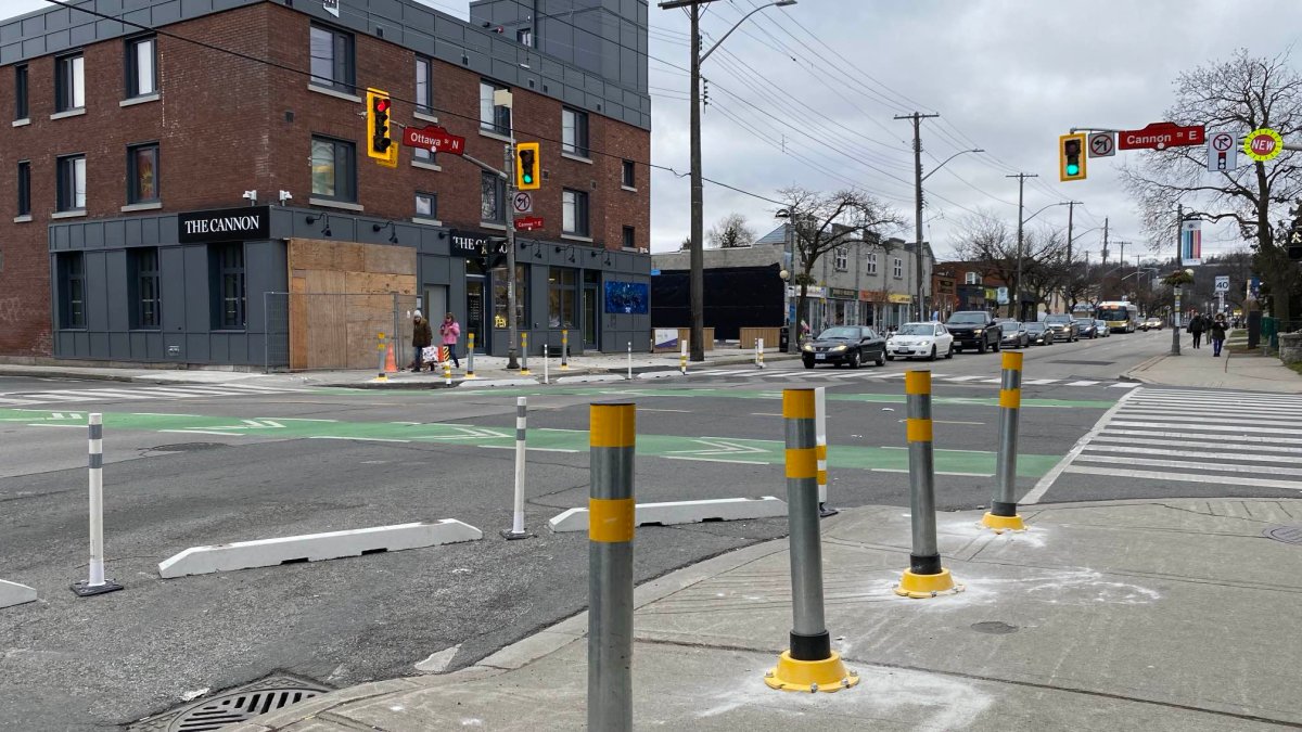 Photo of bollards placed near the Poke Co restaurant on Ottawa Street North at Cannon weeks after a vehicle damaged a section of the restaurant in an overnight crash.