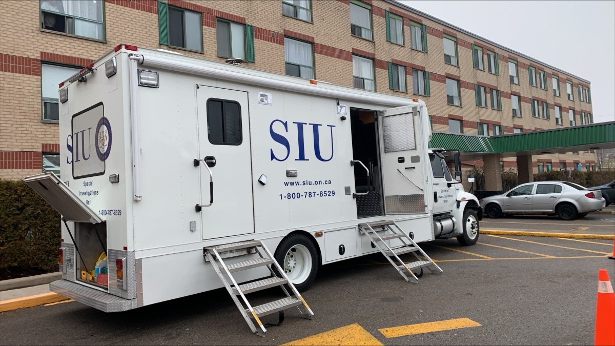 SIU truck parked outside an apartment building in Newmarket, Ont. on Dec. 8, 2023.