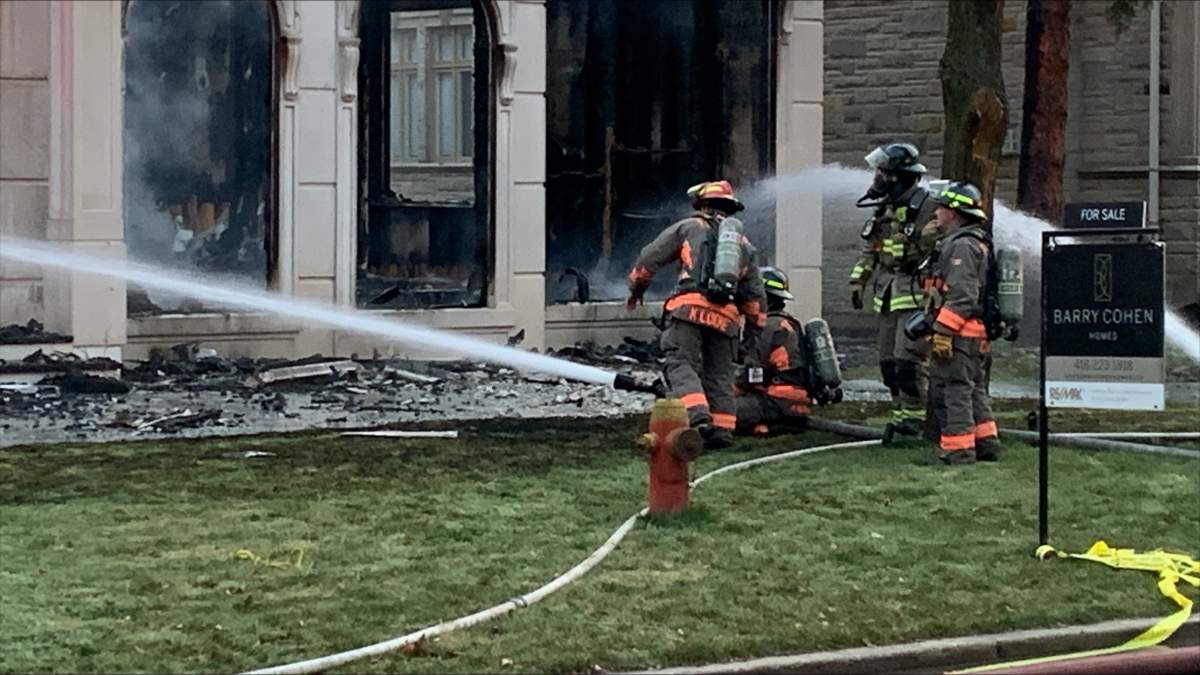 Large fire breaks out at a home on Dempsey Crescent in Toronto on Dec. 14, 2023.