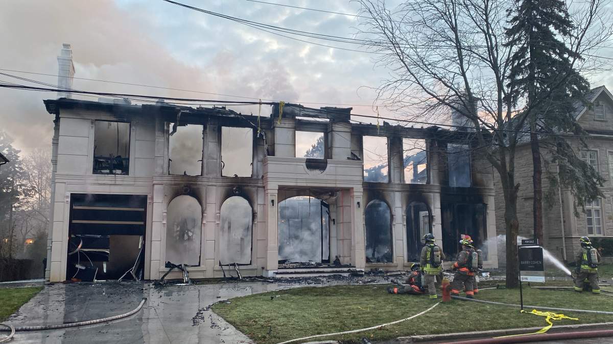 Large fire breaks out at a home on Dempsey Crescent in Toronto on Dec. 14, 2023.