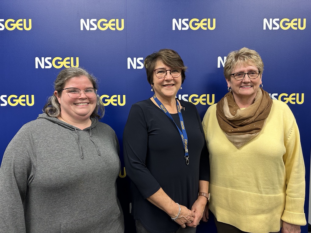 CCA Amanda Hemming (left), NSGEU President Sandra Mullen (centre), and CCA Audrey Oliver (right).