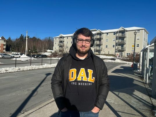 Evan Trenholm standing at the Cobequid bus terminal in Lower Sackville, N.S.