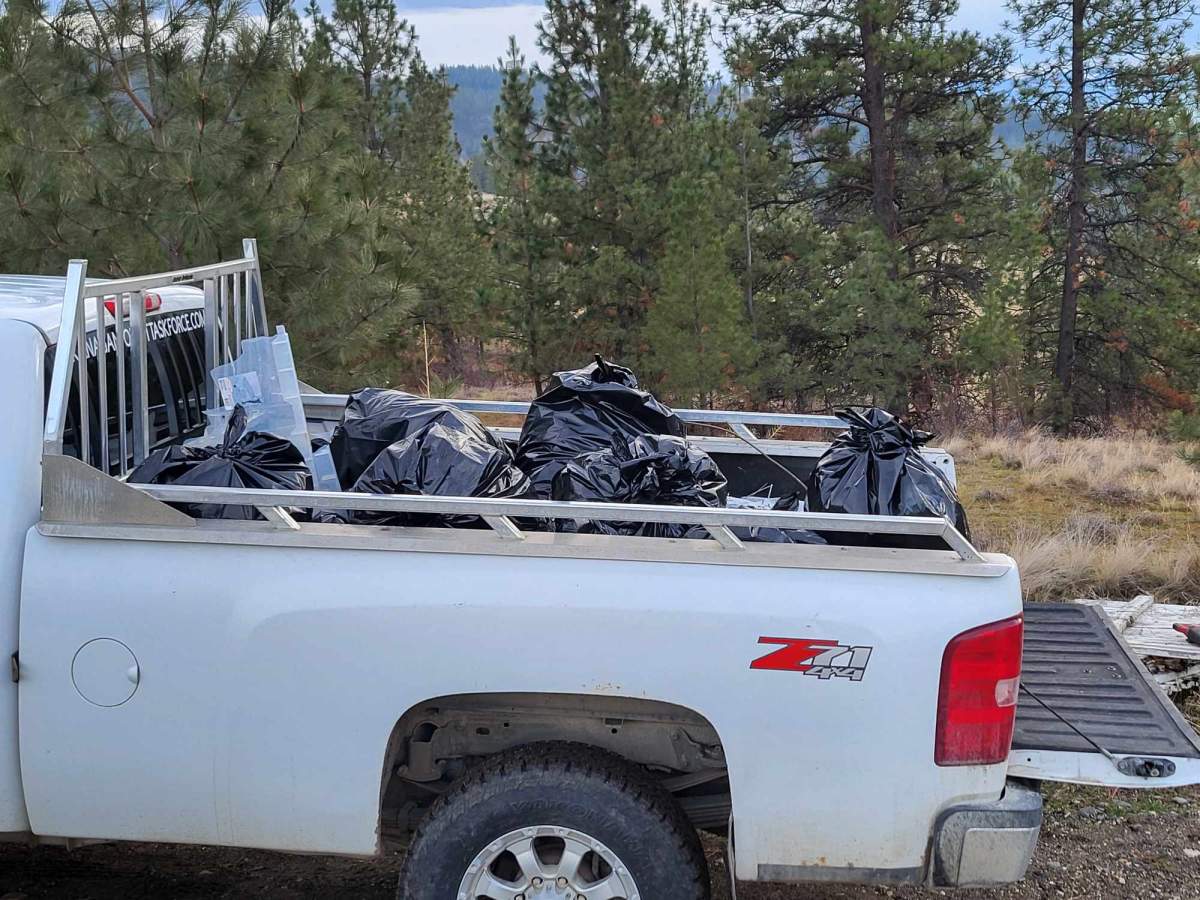 A photo showing some of the garbage that the Okanagan Forest Task Force pulled from ditches along a local backcountry road on Friday.