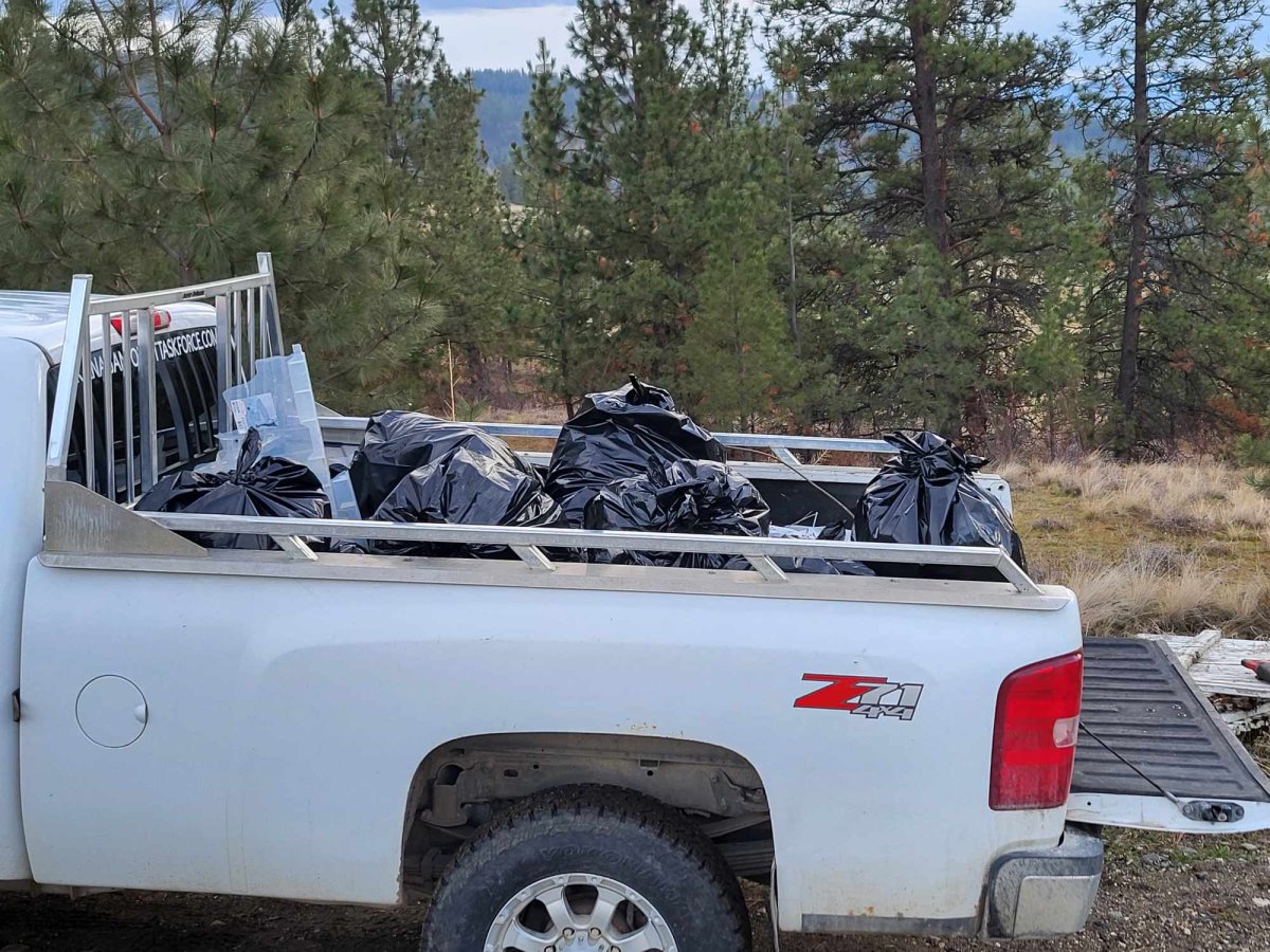 A photo showing some of the garbage that the Okanagan Forest Task Force pulled from ditches along a local backcountry road on Friday.