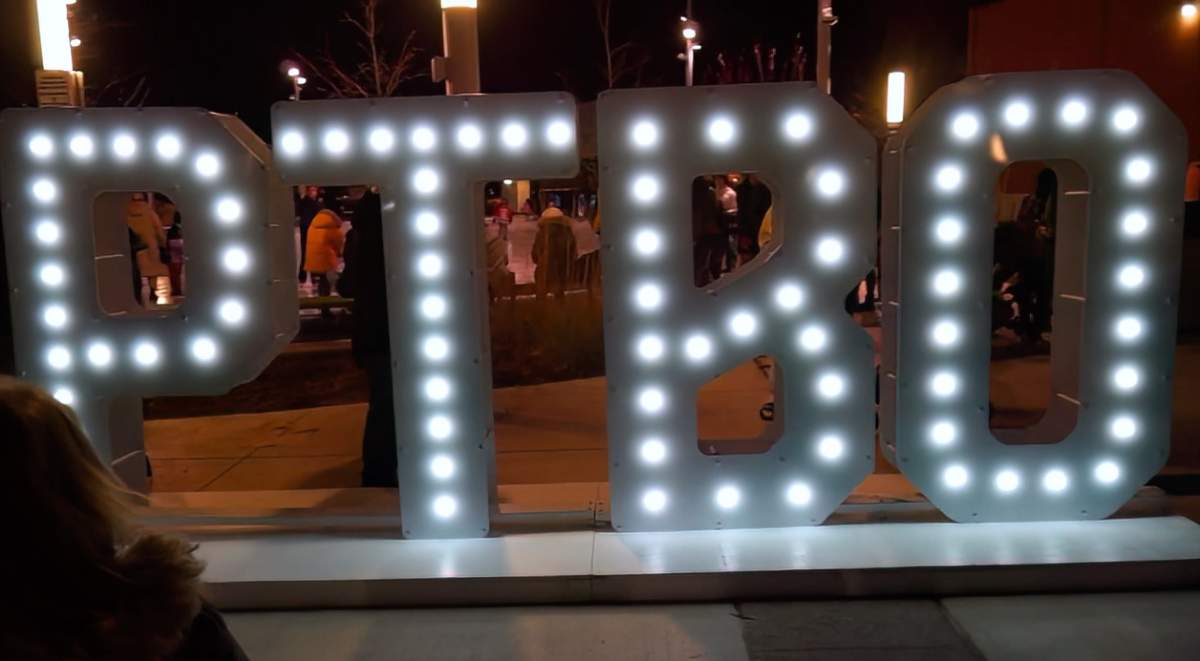 The new “PTBO” sign at Quaker Foods City Square was allegedly damaged by a woman using a hatchet.