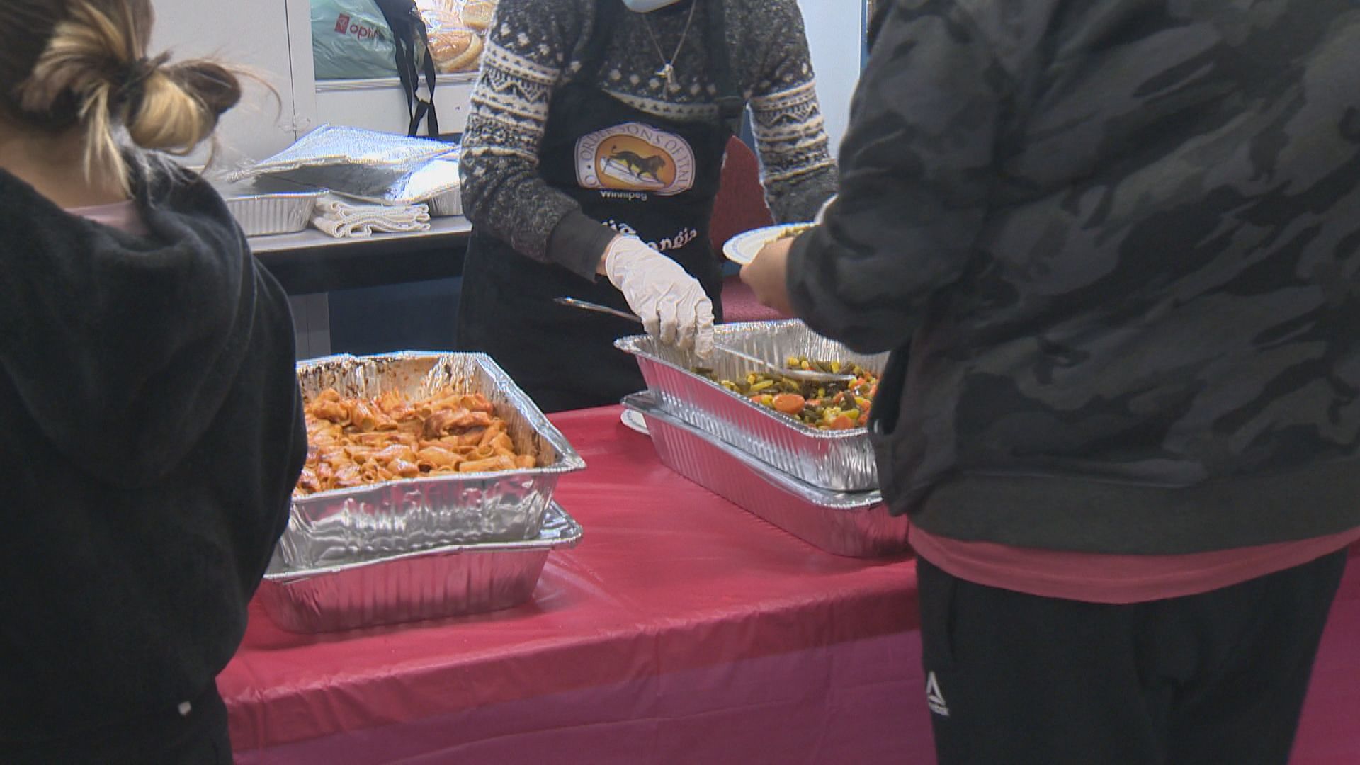 Winnipeg’s Rossbrook House celebrates Christmas Eve with feast and gifts