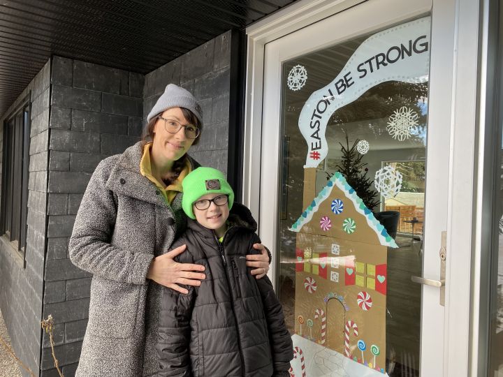 Amanda Moppett-Beatch and her 10-year-old son Easton are grateful for their neighbours' holiday season support during his treatment for brain cancer.