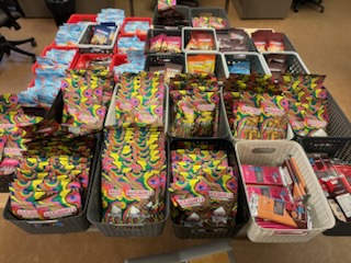 Police say roughly $49,000 worth of psychedelic mushroom products were seized in the raid.