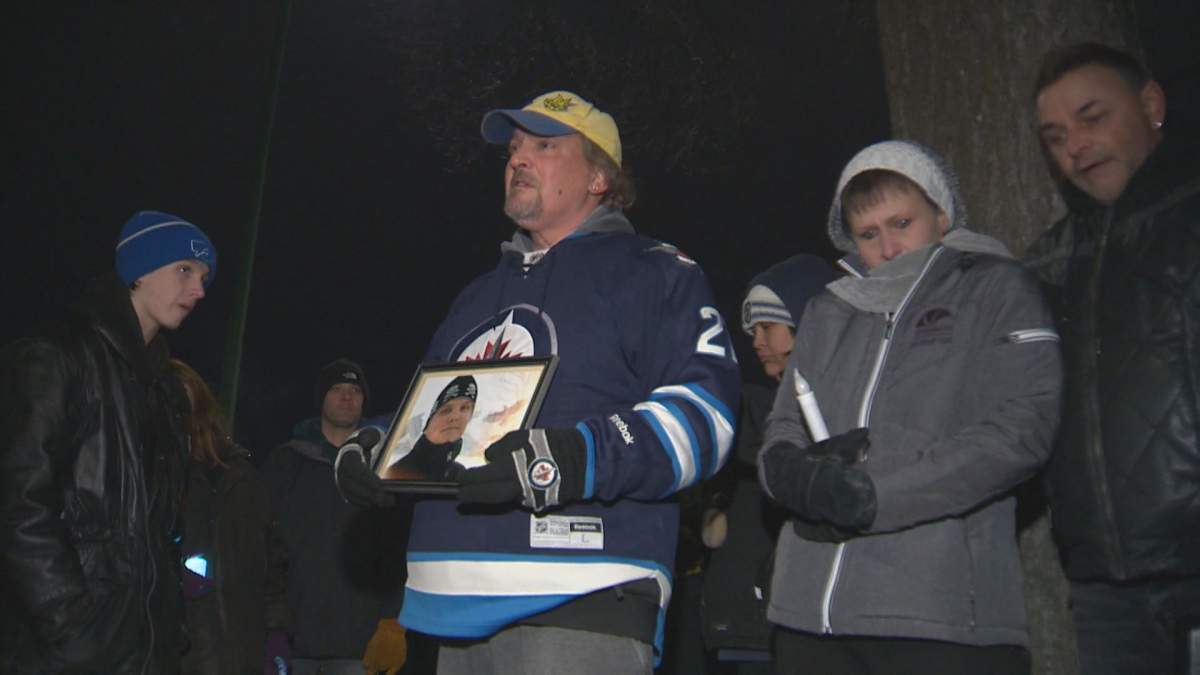 The family holds a vigil at the intersection of Inkster and McGregor one year after Cody’s death.