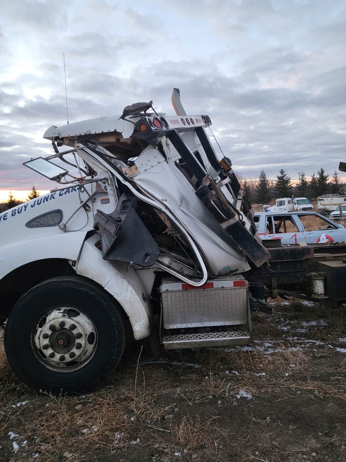 A tow truck driver suffered serious injuries after his truck was struck by a vehicle while he was responding to a call.