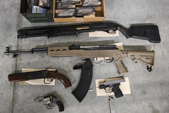 Kitchener raid yields guns, drugs, money and a taser: police