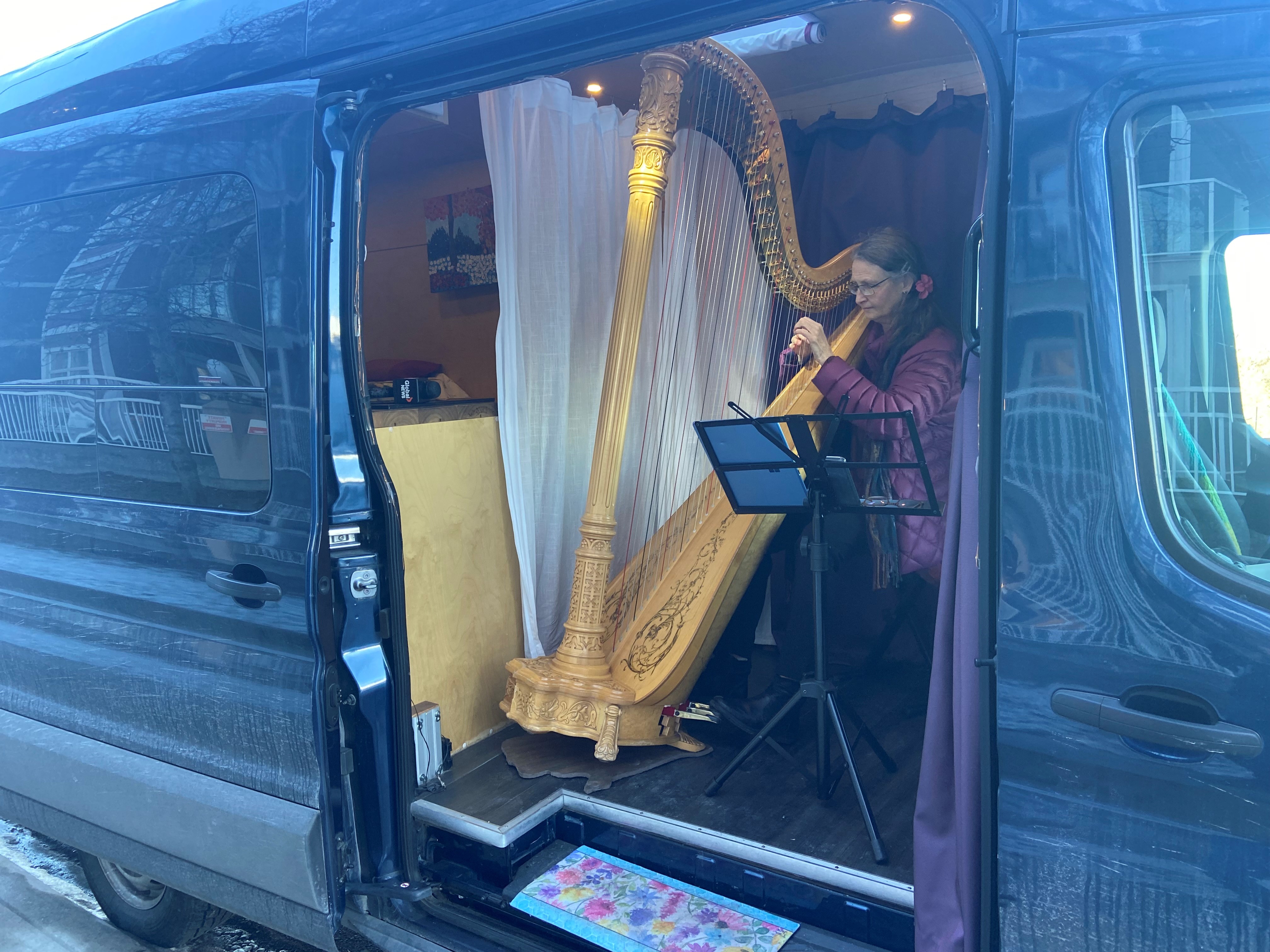 Calgary harpist plans new year adventures after a North American road trip in a mobile concert hall