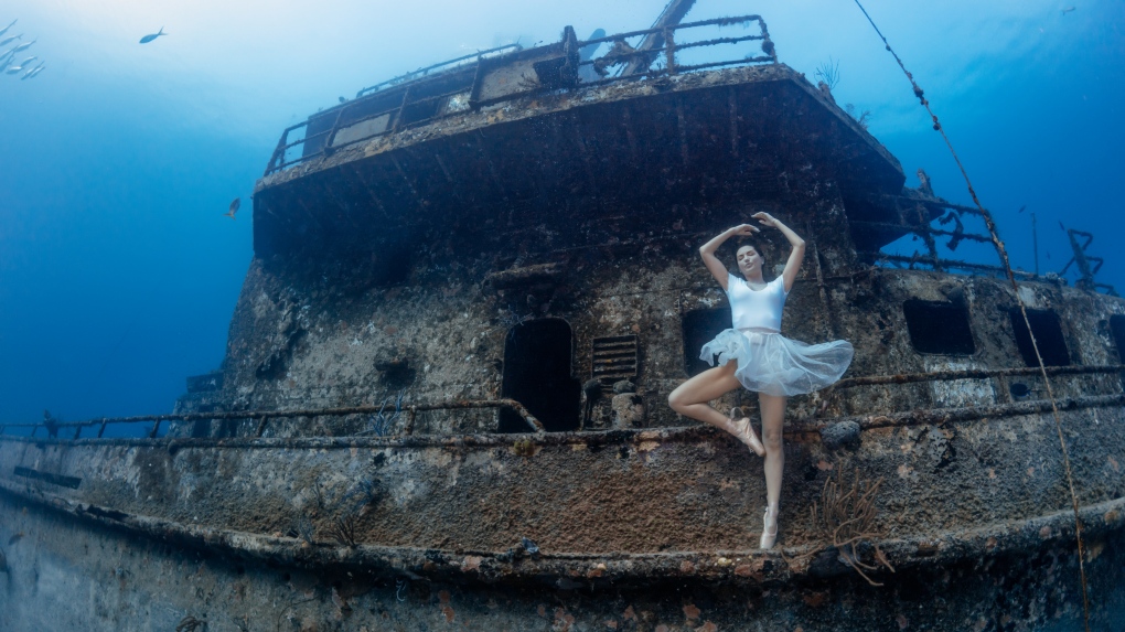 Kim Bruneau is photographed by Pia Oyarzun in a record-breaking deep sea photoshoot in Nassau, Bahamas.