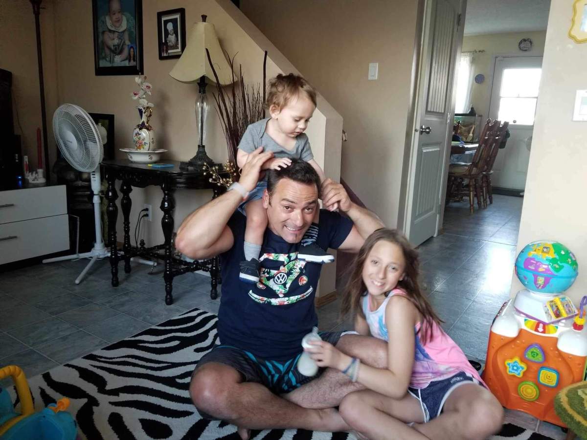 Milo with dad and sister