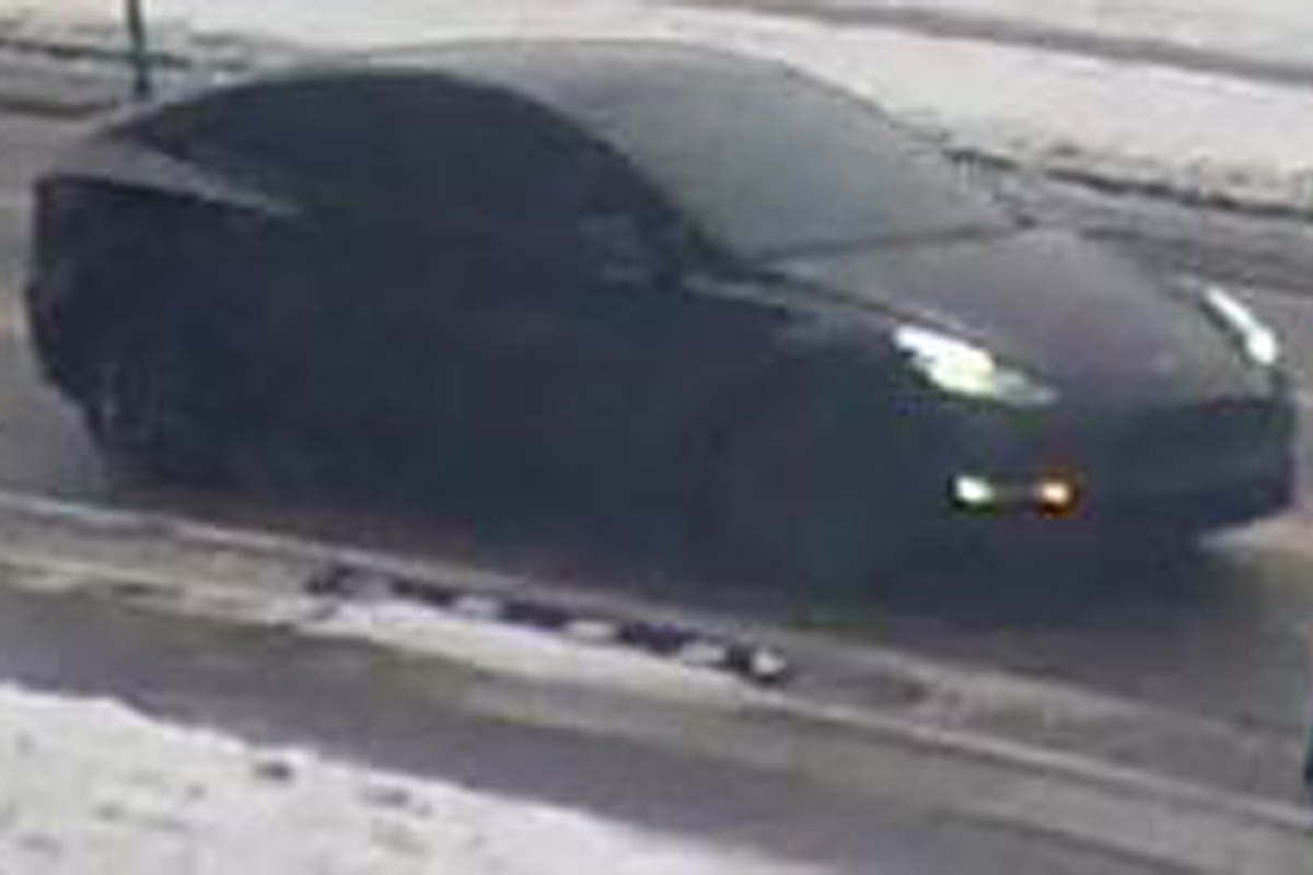 Waterloo police say they are looking for a black, four-door Tesla.
