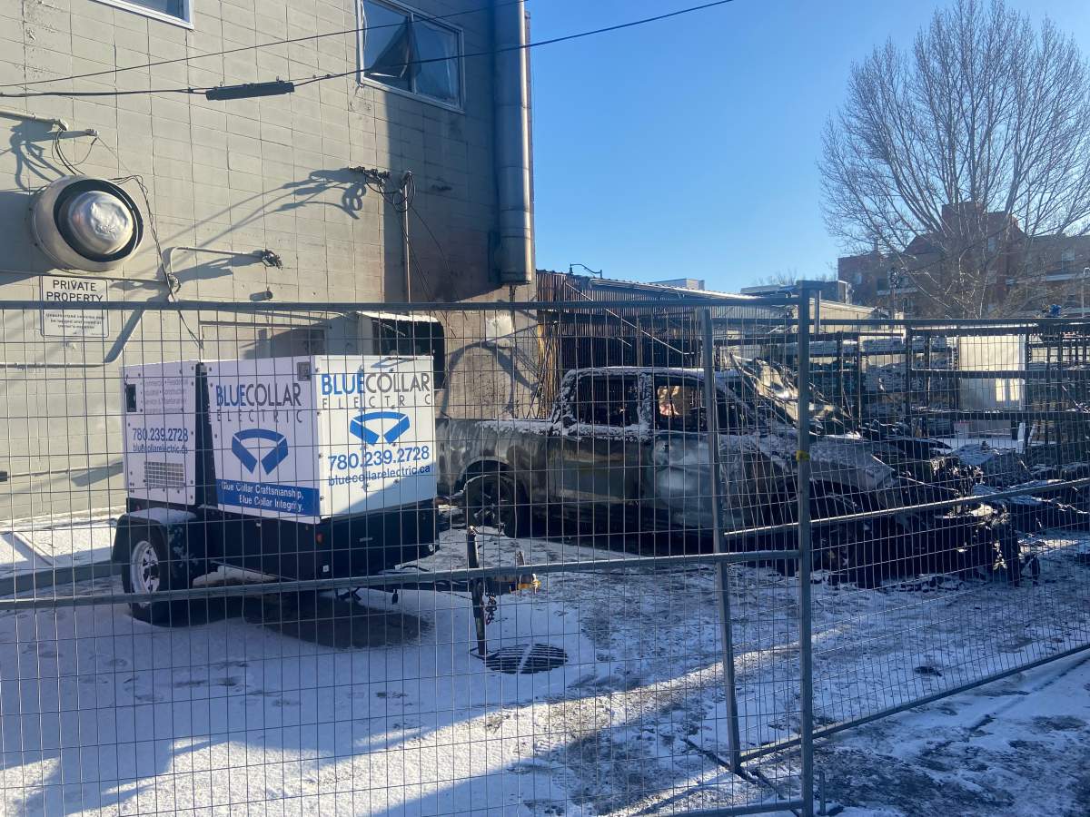 Cleanup begins after a fire at Zocalo café and greenhouse at 10826 95 Street in Edmonton's McCauley neighbourhood on Jan. 3, 2024.