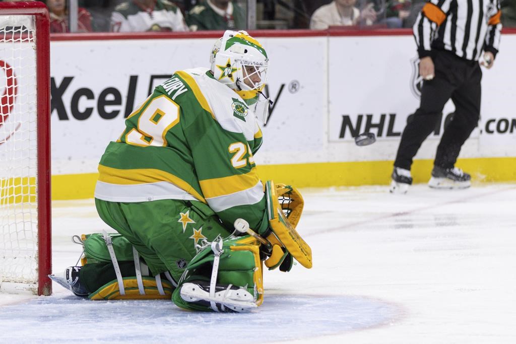 Minnesota Wild goaltender Marc-Andre Fleury makes a save during the second period of an NHL hockey game against Winnipeg Jets, Sunday, Dec. 31, 2023, in St. Paul, Minn.
