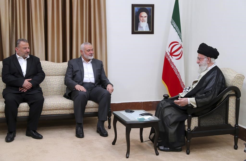 Iran’s supreme leader, Ayatollah Ali Khamenei, right, meeting Hamas leaders Ismail Haniyeh, centre, and his deputy Saleh Arouri in Tehran, Iran, on June 21, 2023. (Office of the Iranian Supreme Leader via AP, File)