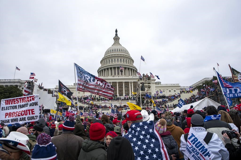 Rioters loyal to President Donald Trump gather on the West Front of the U.S. Capitol in Washington on Jan. 6, 2021.