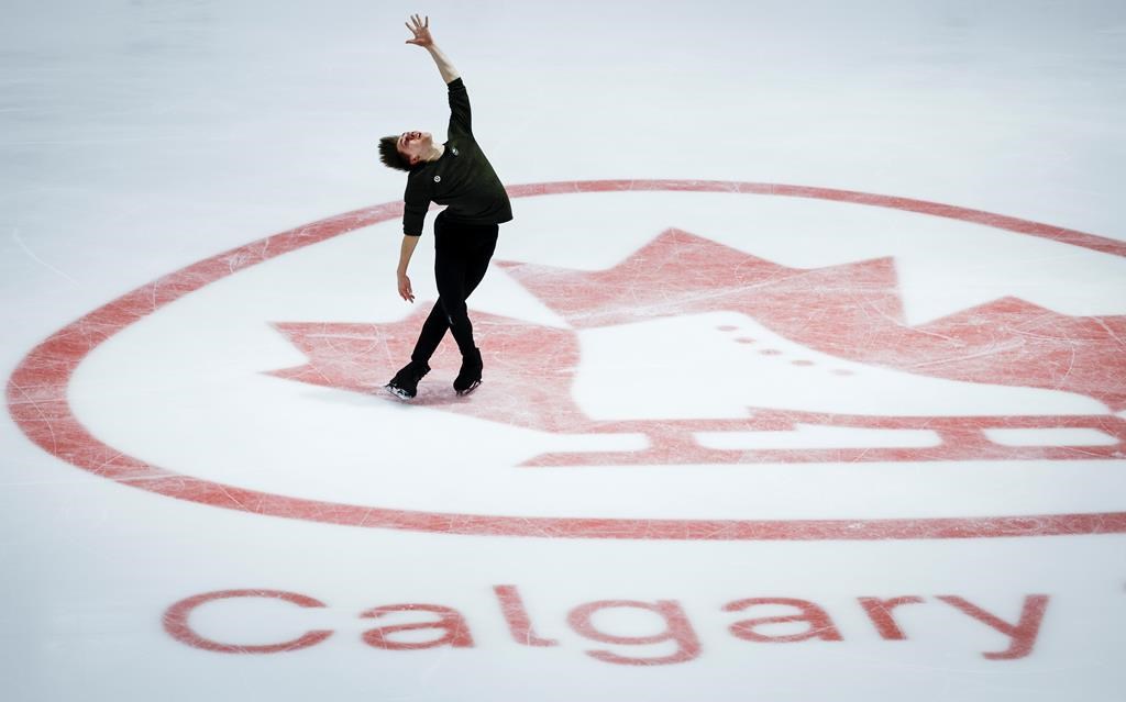 Roman Sadovsky, of Ontario, skates during a practice session at the Canadian figure skating championships in Calgary, Thursday, Jan. 11, 2024. Roman Sadovsky says he's been greeted with "you made it" and "you have skates" at the Canadian figure skating championships in Calgary. THE CANADIAN PRESS/Jeff McIntosh