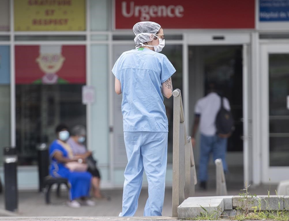 The number of new nursing licences issued in Quebec has reached a 10-year low. The latest workforce report from the professional order that regulates nursing in the province shows it granted 2,864 licenses between April 2022 and March 2023.A health-care worker is shown outside a hospital in Montreal, Thursday, July 14, 2022.