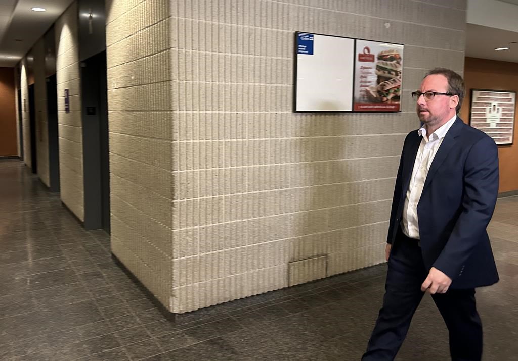 Jonathan Bettez is shown at court in Montreal on Monday, Jan. 22, 2024. The lawyer for Bettez, a Quebec man who provincial police say remains a suspect in the disappearance and death of a young girl 16 years ago, says he is eager to testify in a lawsuit against the authorities. THE CANADIAN PRESS/Sidhartha Banerjee.