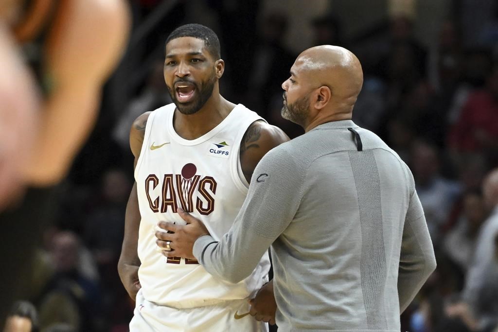 Cleveland Cavaliers' Tristan Thompson, left, is held back by head coach J.B. Bickerstaff, after Thompson was called for a technical foul during the second half of an NBA basketball game against the Washington Wizards, Friday, Jan. 5, 2024, in Cleveland.