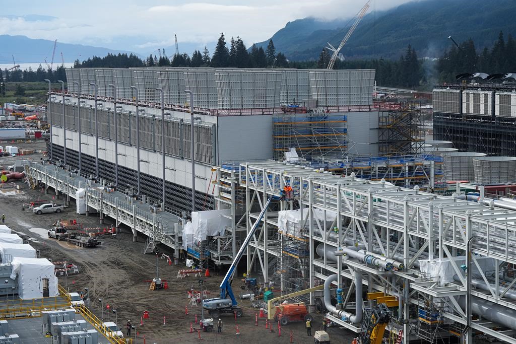 Cooling towers used to dissipate heat generated when natural gas is converted into liquefied natural gas are seen under construction at the LNG Canada export terminal, in Kitimat, B.C., on Wednesday, September 28, 2022.&nbsp;Canada's energy industry is reacting with dismay to U.S. president Joe Biden's move to pause approvals of new liquefied natural gas (LNG) export terminals in that country. THE CANADIAN PRESS/Darryl Dyck.