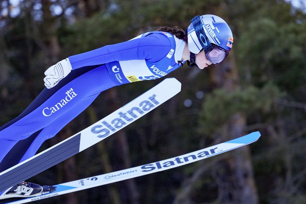 Canada's Alexandria Loutitt competes at the Women Normal Hill Individual Ski Jumping World Cup event in Villach, Austria, Thursday, Jan. 4, 2024. Loutitt captured World Cup bronze in women's ski jumping on Saturday for her sixth podium of the season. THE CANADIAN PRESS/AP-Darko Bandic