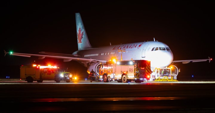 温哥华加人队飞机在YVR临时偏离滑行道，球队回家。