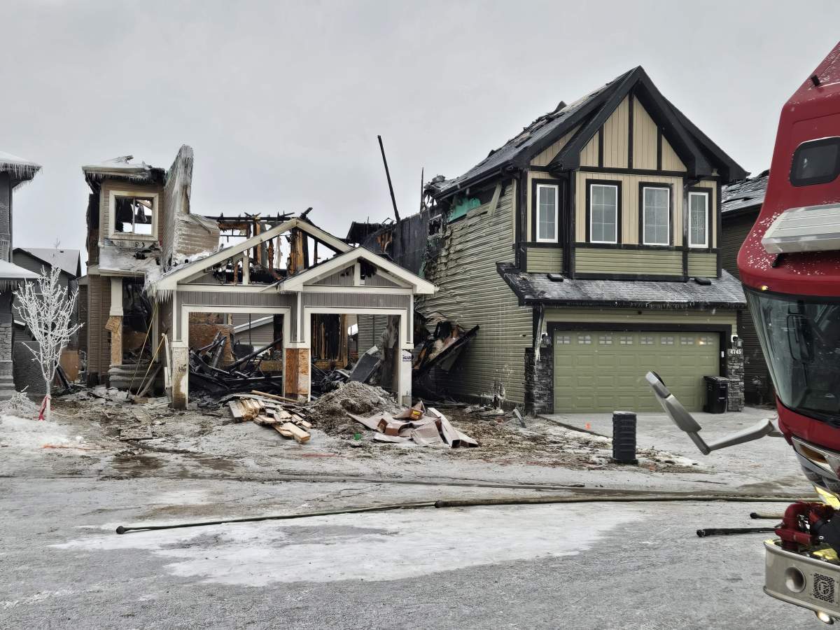 A home being built in deep south Edmonton's Allard neighbourhood was destroyed in a fire that left extensive damage to a neighbouring house as well on Sunday, Jan. 7, 2024.