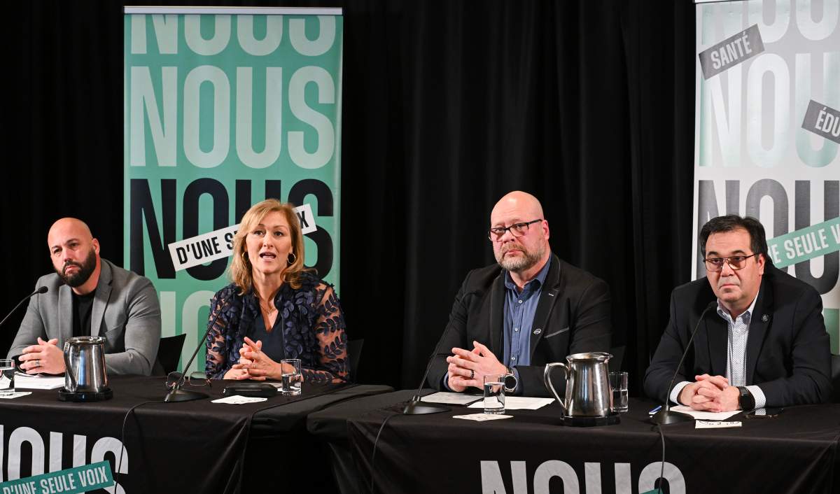 Common Front union leaders, from left, Eric Gingras, president of the CSQ, Magali Picard, president of the FTQ, Robert Comeau, president of the APTS and Francois Enault, CSN vice-president, speak during a news conference in Montreal, Sunday, January 7, 2024, where they updated the media on negotiations with the government.