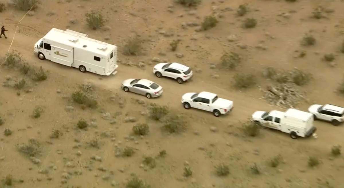 This aerial still image from video provided by KTLA shows law enforcement vehicles where several people were found shot to death in El Mirage, Calif. on Wednesday, Jan. 24, 2024.