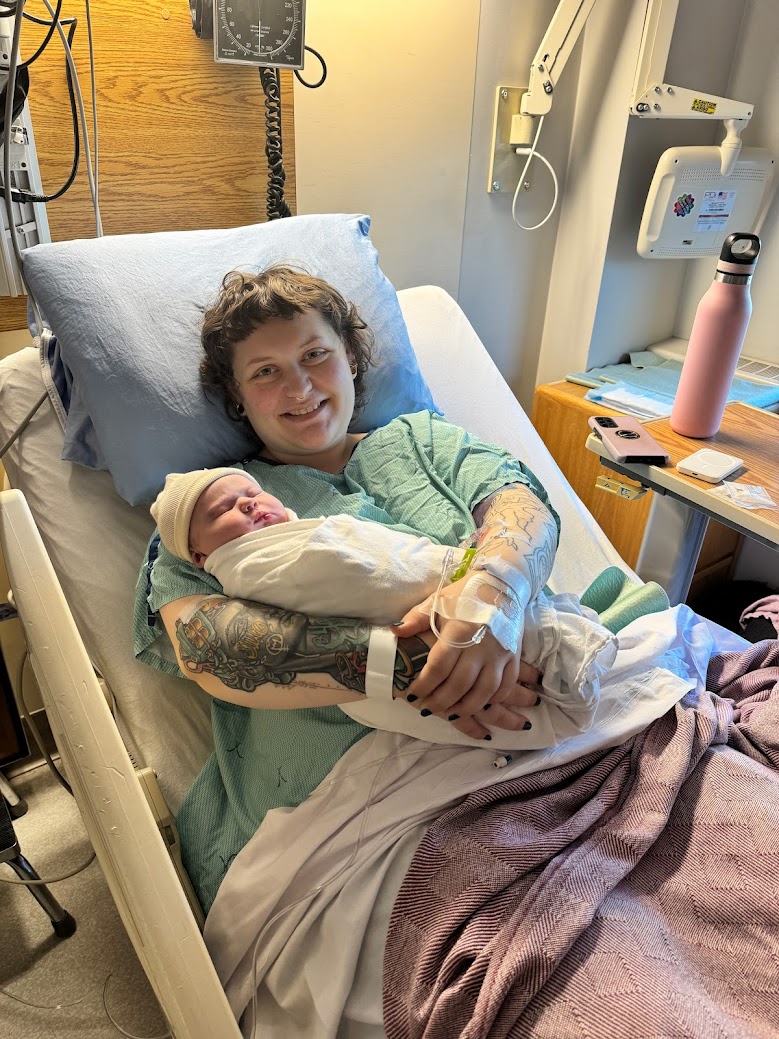 Laura Falk cradles her daughter Isley, Edmonton's first baby of the year.