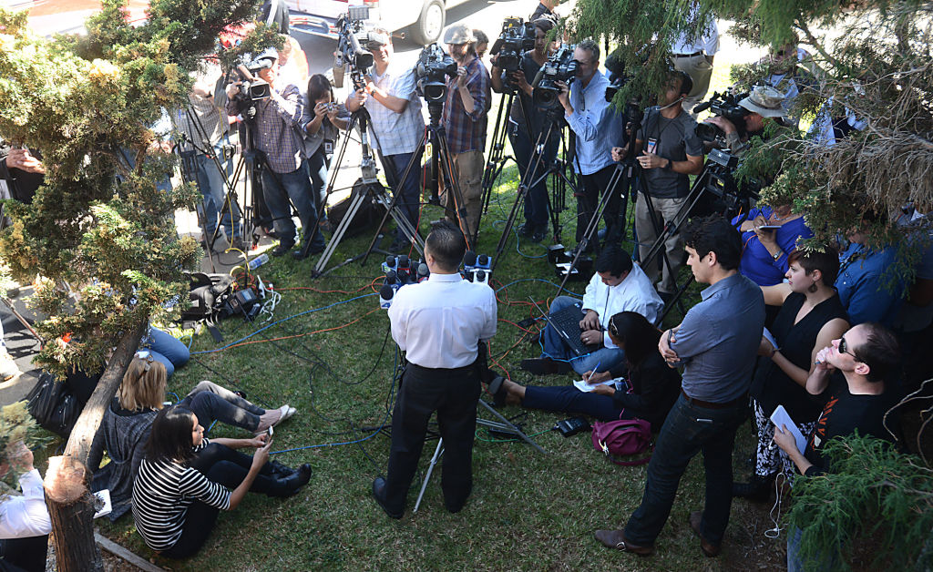 FILE – Lt. Kenny Park with the Vallejo Police Department fields questions from the media during a press conference about the abduction and ransom of Denise Huskins on March 25, 2015. Park confirmed that Huskins was found safe in Huntington Beach.