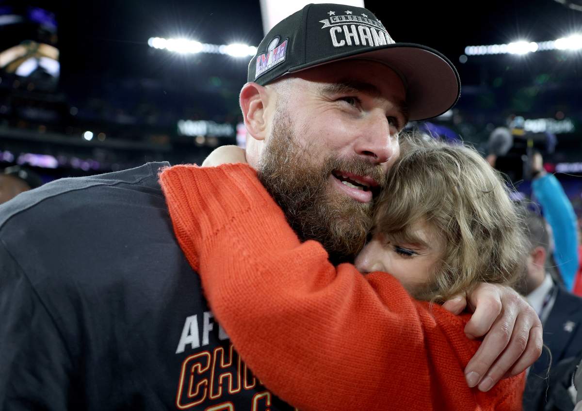 Travis Kelce #87 of the Kansas City Chiefs celebrates with Taylor Swift after a 17-10 victory against the Baltimore Ravens in the AFC Championship Game at M&T Bank Stadium on January 28, 2024 in Baltimore, Maryland.